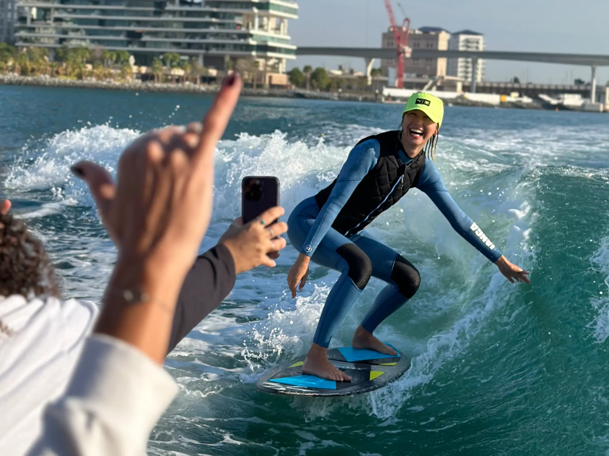 girl surfing the wake in palm island