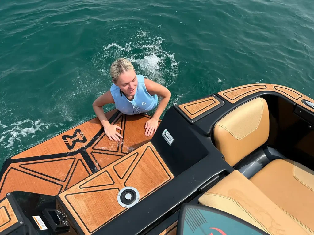 girl in the getting into boat.